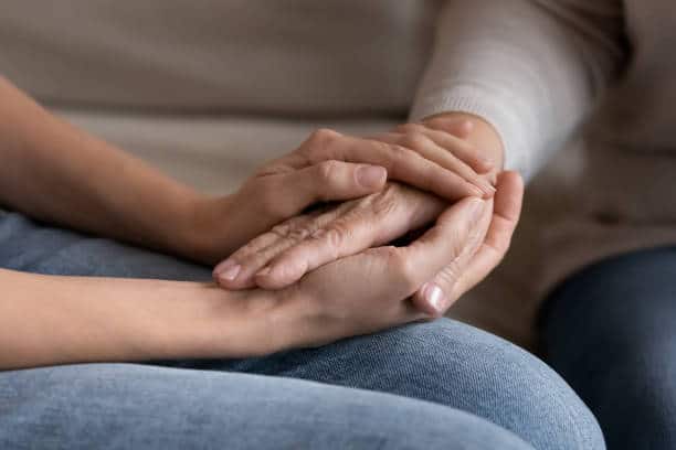 Elegant law office desk with scales of justice, legal books, and leather chair