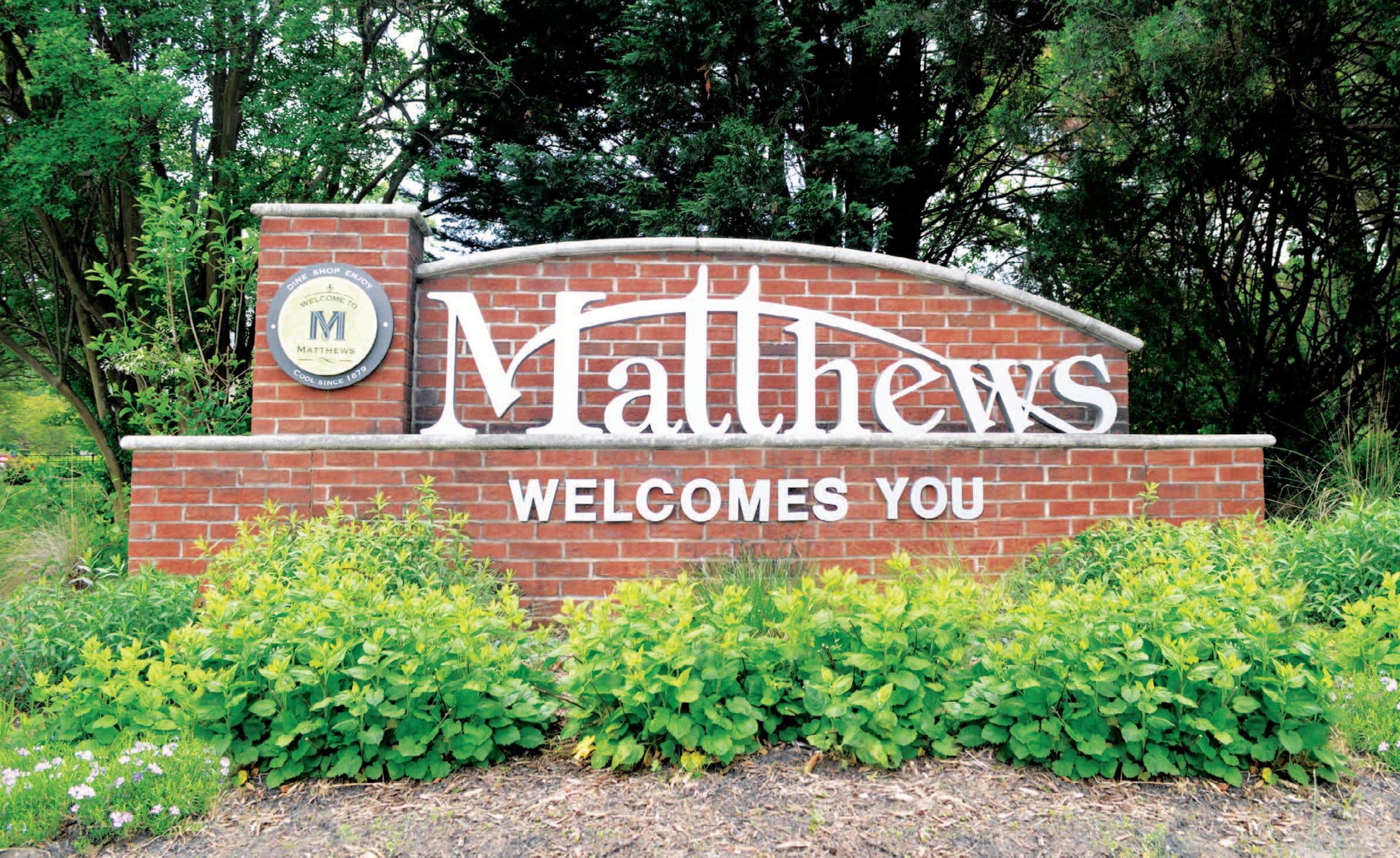 Matthews city skyline with modern buildings and downtown view at sunset